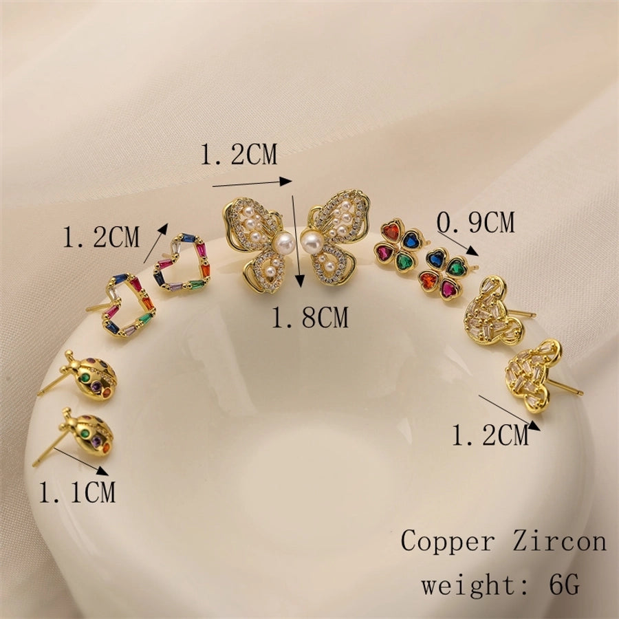 1 pair elegant streetwear heart shape butterfly plating inlay copper zircon gold plated ear studs